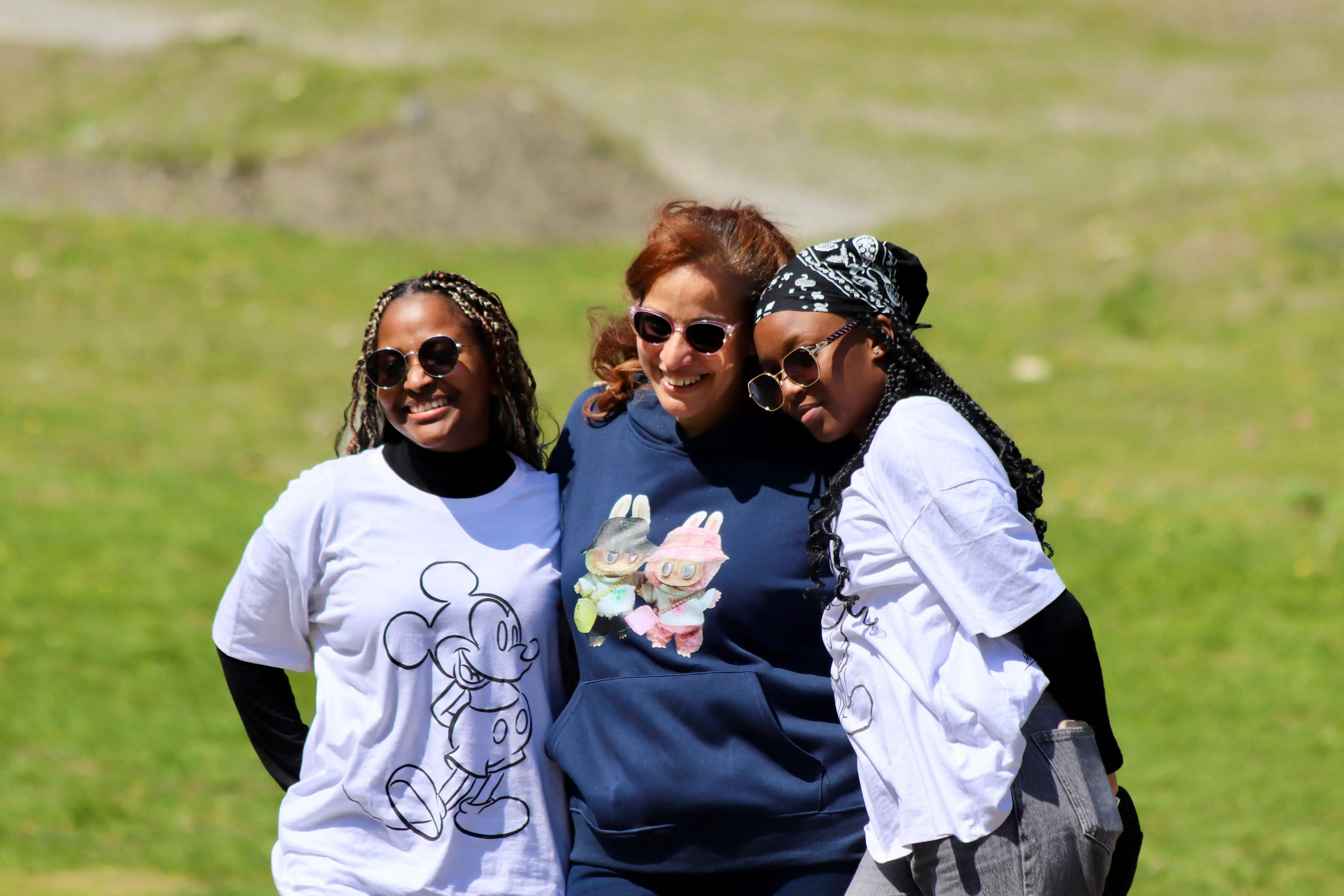 EtudyGo Student Union members gathered around the ESU banner on the grass in Gabala